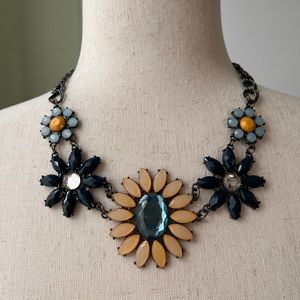 Floral statement necklace with large blue stone